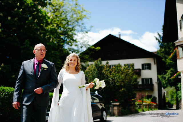 bride and groom heading to the church