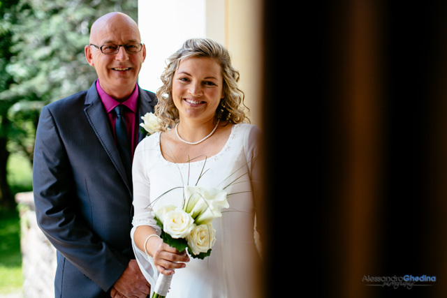 bride and groom ready to enter the church for the wedding ceremony