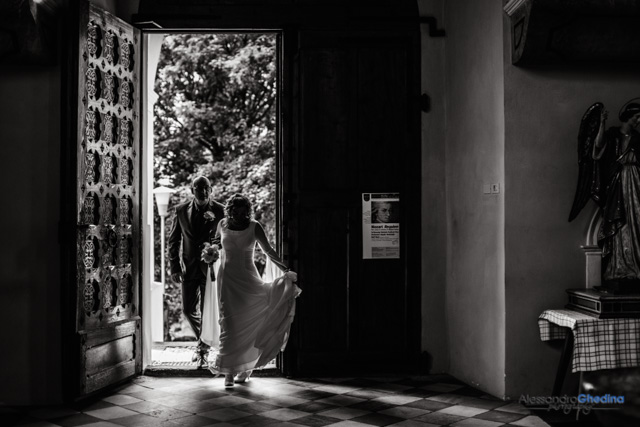 bride and groom ready to enter the church for the wedding ceremony