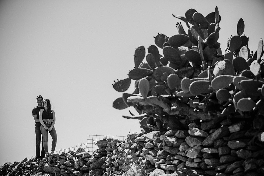 AGIOS SOSTIS BEACH COUPLE PORTRAIT IN MYKONOS EMANUELE & CAROL