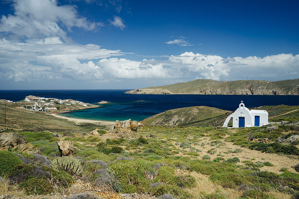 AGIOS SOSTIS BEACH COUPLE PORTRAIT IN MYKONOS EMANUELE & CAROL